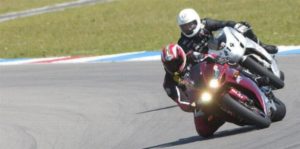Coach Can is working with a track rider 1on1 at TT Circuit Assen in the Netherlands
