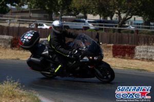 Superbike-Coach in action at cornering class